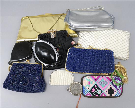 A collection of evening bags and two bakelite necessaires